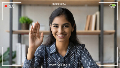 Young indian woman online teacher, counselor, remote tutor or job applicant speaking looking at web cam giving online training, virtual class lesson, video call interview. Webcam view - obrazy, fototapety, plakaty