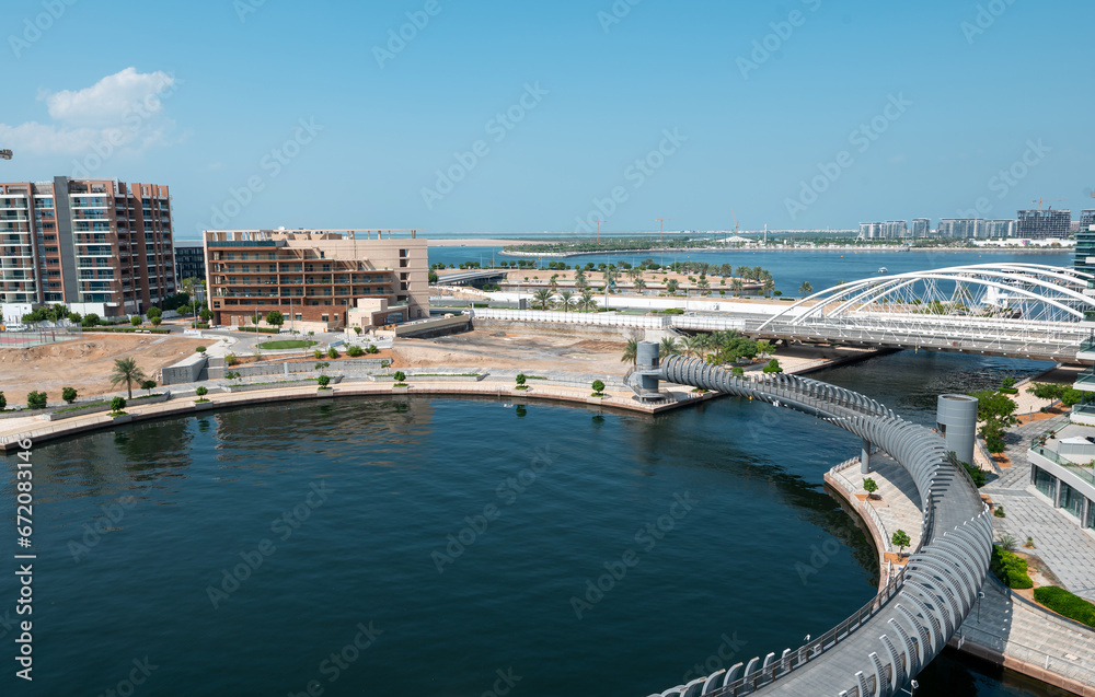 Wall mural al raha, abu dhabi: a modern and convenient residential and commercial area with a waterfront view,  - Wall murals