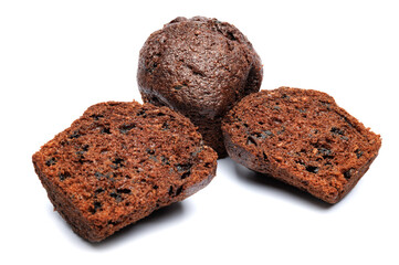 Whole and cut in half chocolate muffin isolated on white background. Chocolate chip muffin.