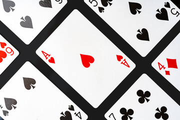 Playing cards on black background studio shot