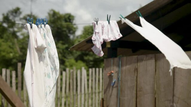 White clothes hanging on the clothesline