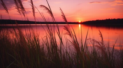 Obraz premium AI-generated illustration of a tranquil lake with a grassy shore during a beautiful sunset