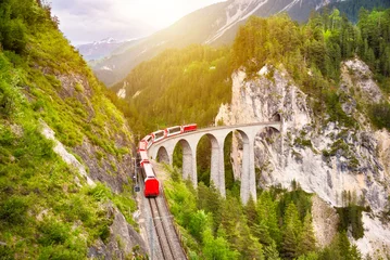 Wall murals Landwasser Viaduct Swiss red train on viaduct in mountain, scenic ride