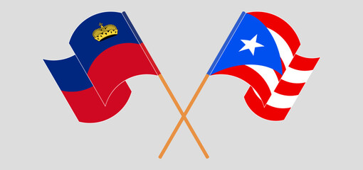 Crossed and waving flags of Liechtenstein and Puerto Rico