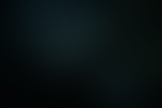 Abstract dark background with black vignette and copy space