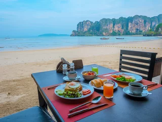 Papier Peint photo autocollant Railay Beach, Krabi, Thaïlande Restaurant table at Railay Beach Krabi Thailand, the tropical beach of Railay Krabi