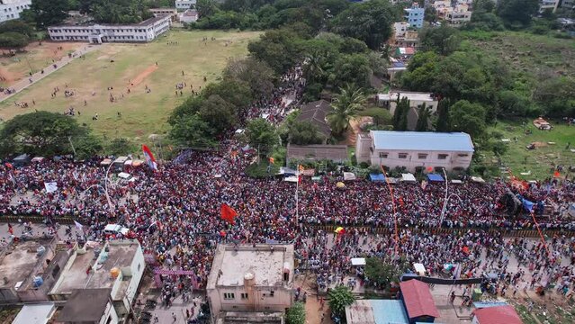 Birds eye view of huge crowd moving on busy roads during immersion of lord ganesha