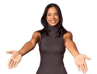 Young Filipina with long black hair in studio showing a welcome expression.