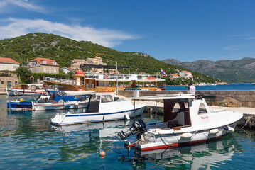 Fototapeta na wymiar Sudjuradj, Croatia - August 09, 2023: Village of Sudjuradj, island of Sipan, near Dubrovnik, Adriatic sea, Croatia