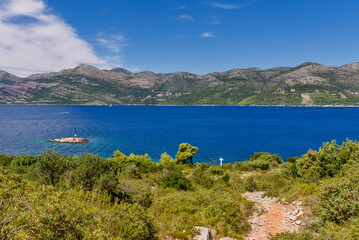 Fototapeta na wymiar Lopud, Croatia - August 09, 2023: Village in Lopud island, Croatia. The Elaphiti Islands is a small archipelago consisting of several islands stretching northwest of Dubrovnik