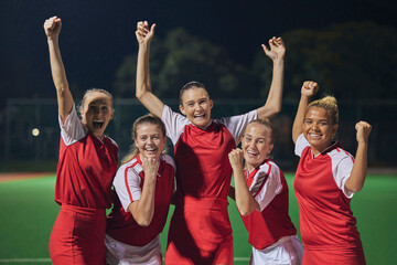 Soccer, winning team, and women celebrate win and teamwork on soccer field. Success, sports and proud girls in group portrait together, winner football team from Brazil on grass at night soccer game. - obrazy, fototapety, plakaty