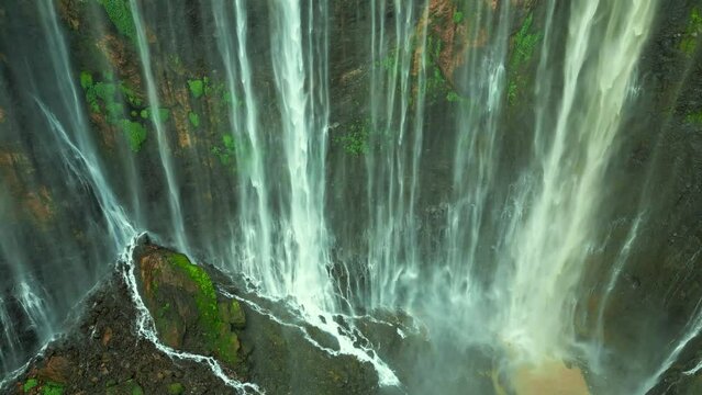 Aerial view powerful Tumpak Sewu waterfall located in Lumajang, East Java, Indonesia.