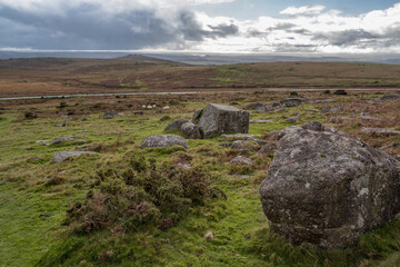 Rugged desolate Dartmoor with single road in background