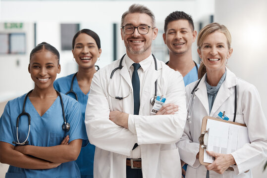 Team Of Doctor And Nurse With Vision, Teamwork And Arms Crossed While Working At A Hospital. Happy Medical Expert, Healthcare And Professional Group Smile At Work Together For Success At A Clinic