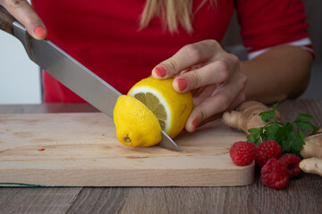 person slicing lemon