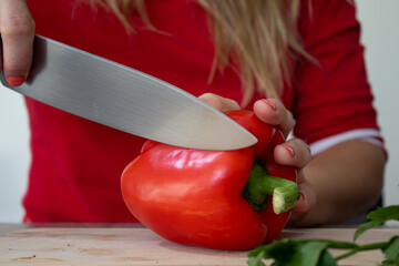 cutting red pepper