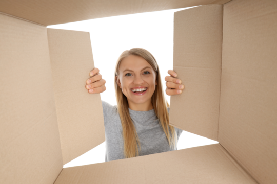 PNG,The girl looks into a cardboard box, isolated on white background - Powered by Adobe