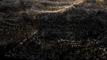 Black glitter with gold flecks. Golden loosened sand on ground.