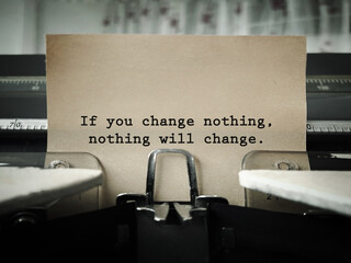 Motivational and inspirational wording. If You Change Nothing, Nothing Will Change written on a...