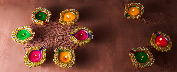 Burning diya on Happy Diwali, background for light festival of India