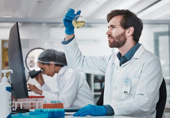 Science, man or scientist in laboratory with chemical liquid after chemistry research or scientific...