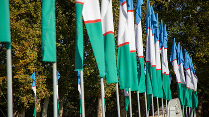 groups of Uzbek flag near to each other
