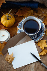 Blank form with pen. place for text. Blank sheet next to a cup of coffee. Top view, invitation to tea