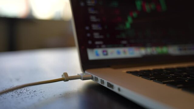 Plugging Charger in to Mac Book Pro And Lighting Up