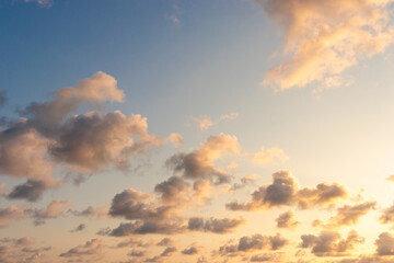 Naklejka na ściany i meble Orange evening sky on a calm beach