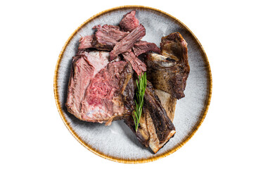 Roasted veal beef short ribs in plate with rosemary.  Transparent background. Isolated