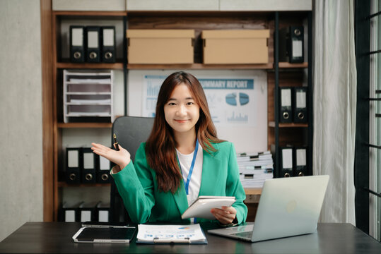 Portrait Of Female Office Businesswoman Startup Daydreaming About Her Work, Startup And Working With Laptop On Office Desk In Office