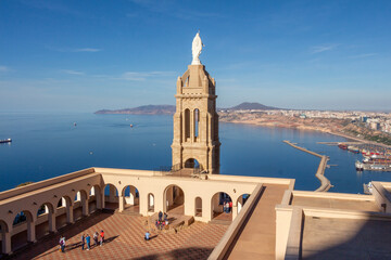 Panoramic view of Oran, Algeria, with the Santa Cruz chapel in the foreground. - obrazy, fototapety, plakaty