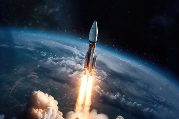 Fototapeta premium Rocket launches into space with a fiery trail, above a blue planet