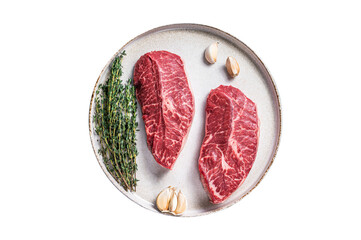 Raw Oyster Top Blade or flat iron roast beef meat steaks on a plate with herbs.  Transparent...