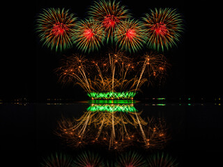 PATTAYA, CHONBURI, THAILAND, Real Fireworks at Pattaya bay, Pattaya national Fireworks Festival contest, November of every Year, Beautiful of bright light fireworks Show in sea reflection, 