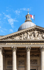 Obraz premium A detail of the façade of the Pantheon, built in 18th century, where many French notable people are buried, Paris city centre, France