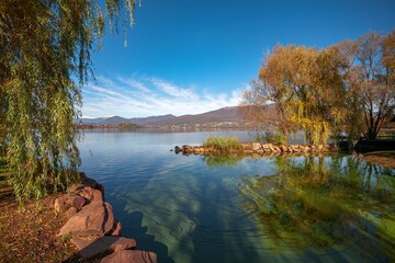 Autumn view of Varese lake in the pre-Alpine region in Lombardy, Italy