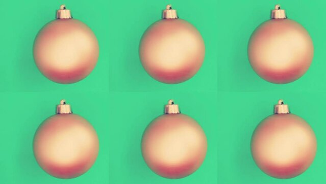 Holiday balls over green background