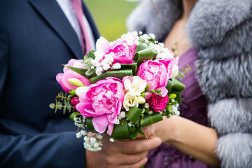 beautiful pink and violet bridal bouquet