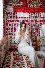 Obraz na płótnie Canvas beautiful bride in gorgeous white wedding dress