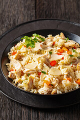 Chicken Fried Rice with vegetables in black bowl