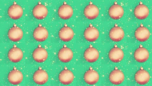 Holiday balls over green background