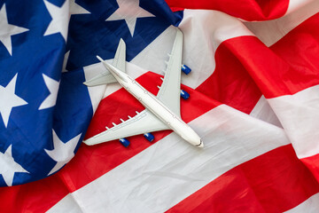 toy jet plane and flag of USA.