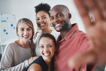 Obraz premium Selfie, friends and teamwork with a black man and team taking a photograph together in a work office. Collaboration, success and business with a male and female employee group posing for a picture
