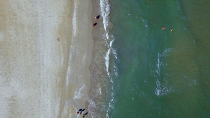 Top view of a beautiful sandy beach and sea waves. Rimini, Italy
