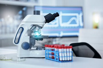 Science, blood sample and microscope in laboratory for research, DNA testing and examination....
