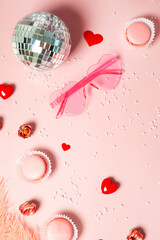 Modern valentine's day vertical card - disco ball, heart glasses and valentine decor on pink background