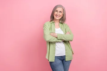Fotobehang Photo of retired woman realtor director confident profession look best her proposition cheap house mockup isolated on pink color background © deagreez