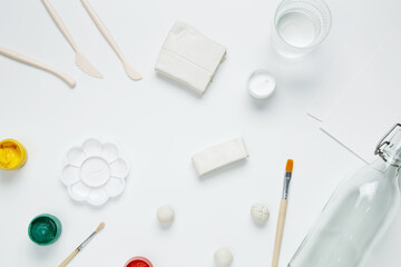 Hobby modeling from clay, tools and accessories for crafting on white background