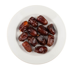 Dates on a plate on a white background